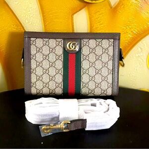 SOLD BUT I CAN ORDER 1 FOR YOU!Brown and tan crossbody with Signature Design